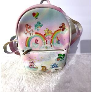 Loungefly Care Bears Rainbow Mini Backpack Pre-loved Gently used inside.